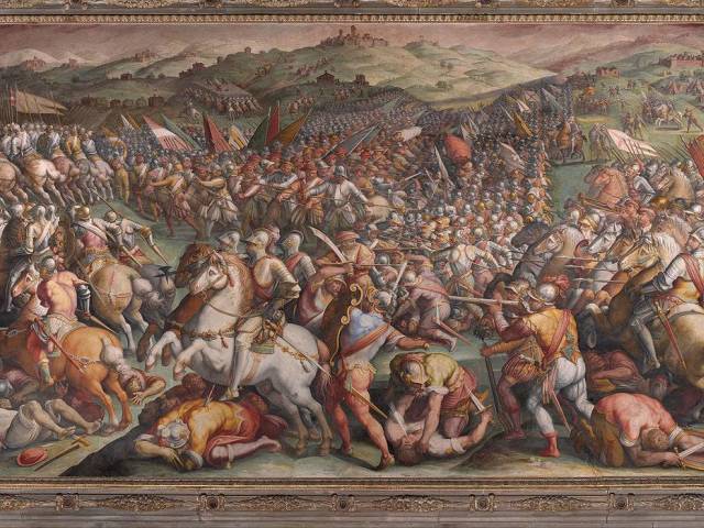 Giorgio Vasari, Battaglia di Scannagallo. Sullo sfondo si vede Lucignano con le due torri della Rocca e del Casseretto.jpg