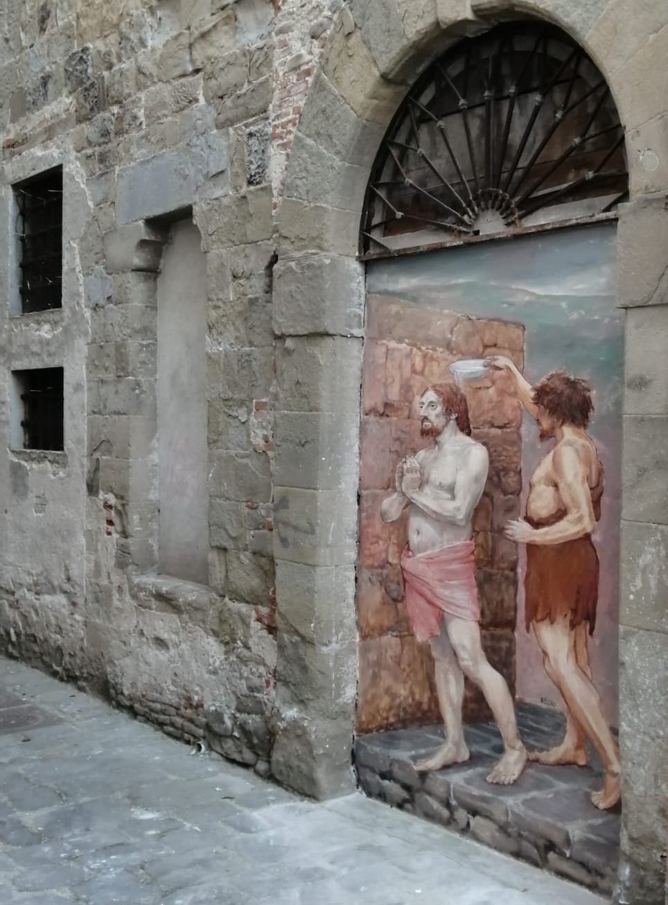 1625664318_battesimo_street_art